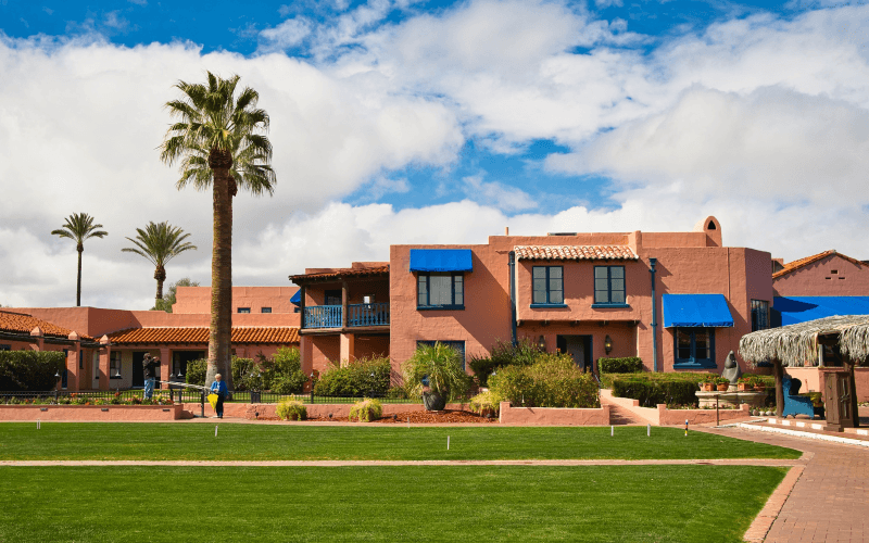 A bright green lawn in front of a building in Tucson, Arizona