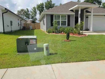 Lawn care service in Milton, 32571