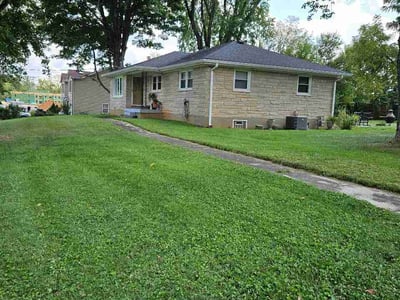 Lawn care service in Louisville, 40229