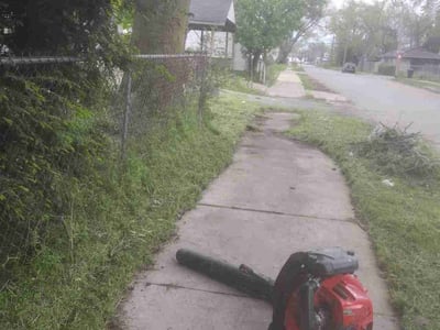 Lawn care service in Detroit, 48210