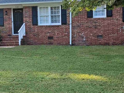 Lawn care service in Fayetteville, 28303
