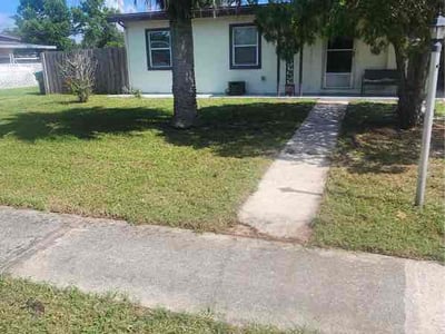 Lawn care service in Deltona, 32725