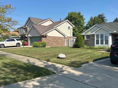 Lawn care service in Trenton, 48183