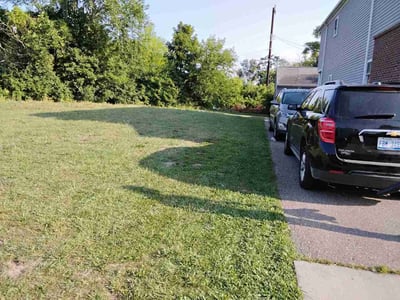 Lawn care service in Highland Park, 48203