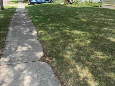 Lawn care service in Lansing, 48911