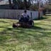 Mj lawn care Logo