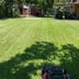 ATX LAWN MAINTENANCE Logo