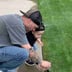 On-Time Lawn care and contracting services Logo