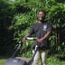 Rhythm & Roots Lawn Care Logo