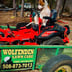 Wolfenden lawn care Logo